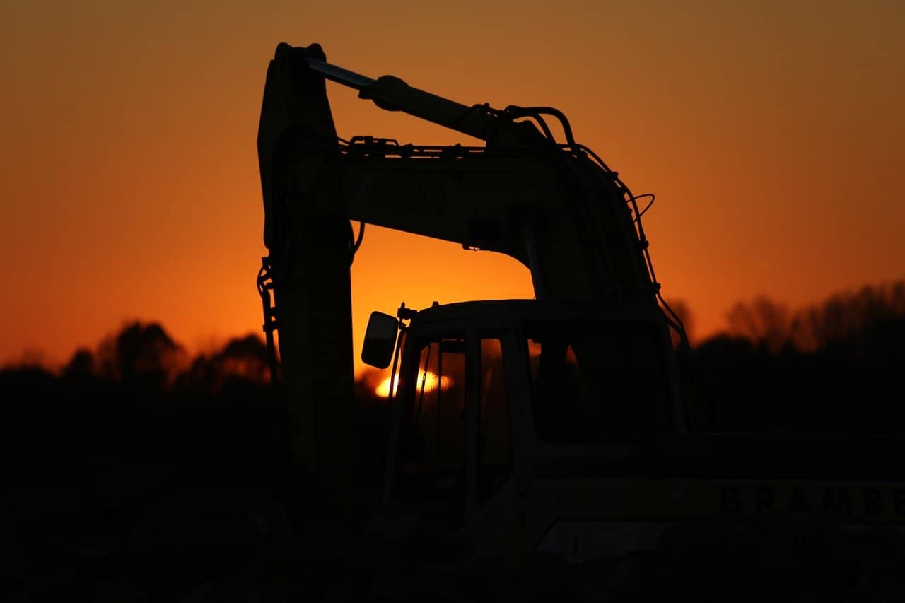 Excavator at sunset